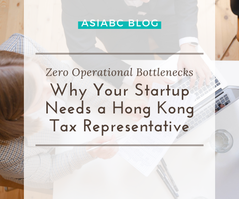 Startup team & tax advisor collaborating over paperwork at a minimalist desk to streamline corporate tax compliance services.